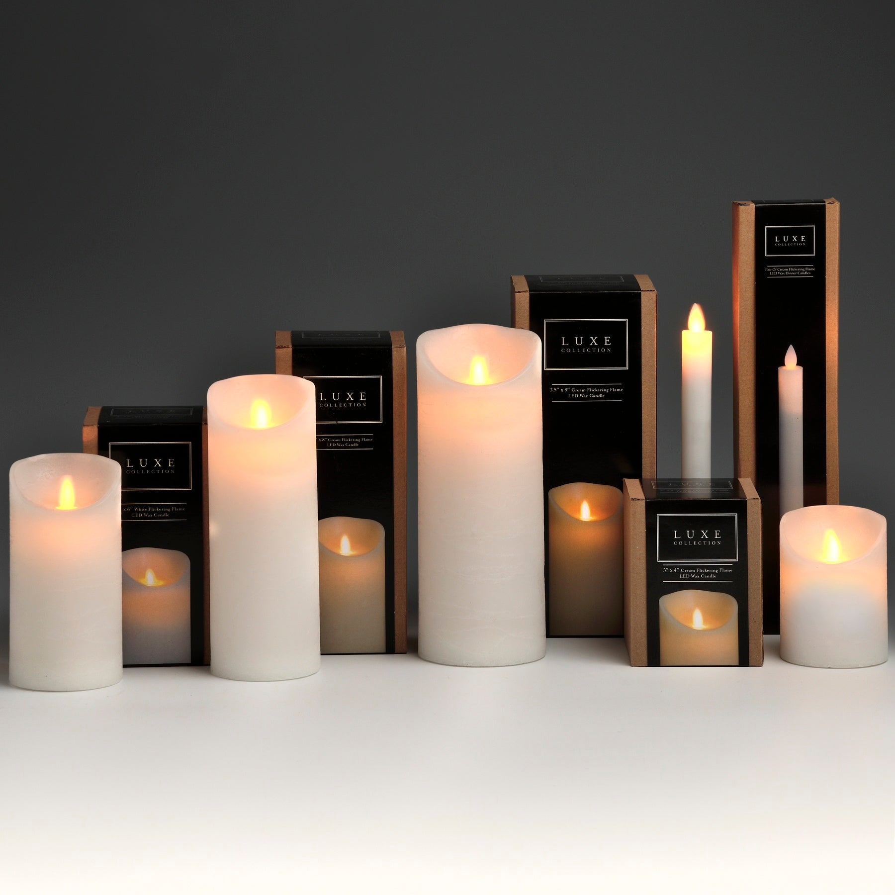 Pair Of White Luxe Flickering Flame LED Wax Dinner Candles